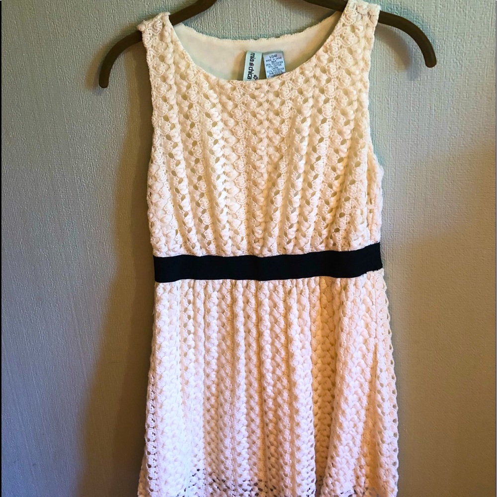 Off white large girls dress with crochet details